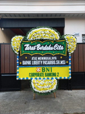 Papan Bunga Duka di Paku