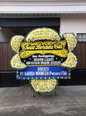 Papan Bunga Duka di Paku