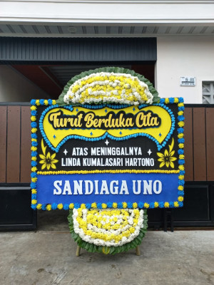 Papan Bunga Duka di Paku